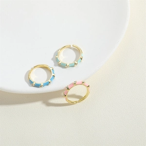 Three-piece set of adjustable gold enamel rings featuring bohemian evil eye patterns
