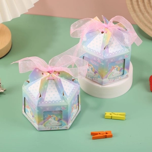 Octagonal carousel wedding favor box with rainbow gradient and pink unicorn design