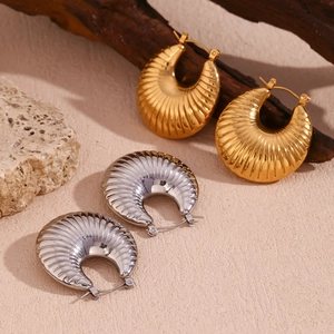 Polished hollow croissant hoop earrings in 18k gold and silver finish for women