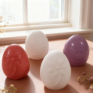 Detailed relief flower pattern on egg-shaped resin molds for DIY candle making