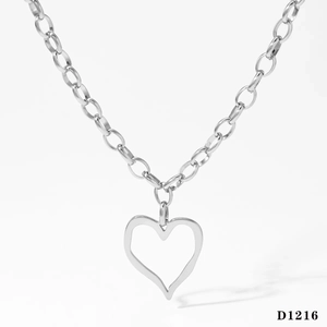 Macro detail of 316 stainless steel heart pendant on a chunky link chain necklace