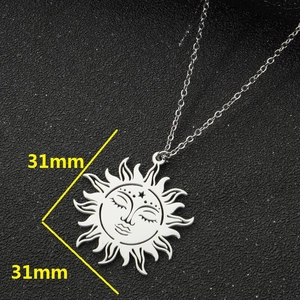 Vintage silver sun face pendant necklace with celestial star detail and 31mm diameter