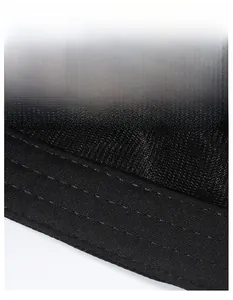 Macro detail of the wide sweatband and breathable mesh lining of the black flat top cap