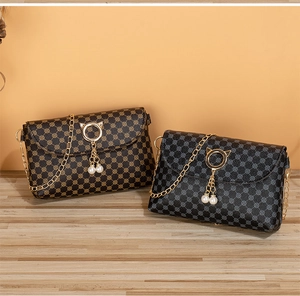 Brown and gray checkered mini crossbody bags with gold cat hardware and pearl tassels