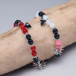 Halloween magnetic spider heart beaded bracelets for couples on driftwood display