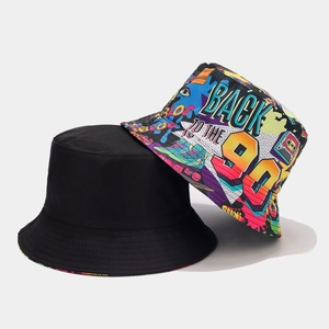 Close-up of 90s vintage graffiti bucket hat and solid black reversible cotton fabric