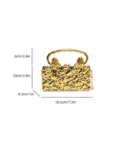 Detail view of gold evening bag dimensions featuring lion head handles and hammer texture