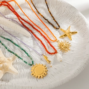 Summer beach style stainless steel beaded necklaces with gold charms on shell tray