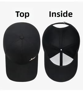 Detail view of cotton baseball cap showing top panel seams and breathable mesh interior