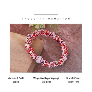 Baseball themed wood bead bracelet with red blue white paint splatters and sports charms
