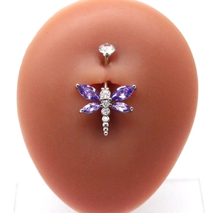 Detail of silver dragonfly navel ring with purple and clear stones on silicone model