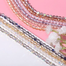 Macro shot of 3mm faceted glass beads in various colors for DIY jewelry making