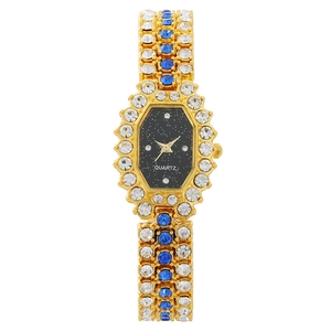 Elegant gold bracelet watch for women with colorful crystals and blue rhinestones