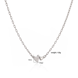 Elegant silver dual heart necklace with crystals and measurement details on white background