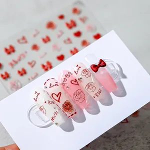 3D butterfly nail stickers with red hearts, roses and artistic lettering on white card