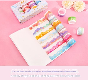 Detail of colorful wavy edge washi tapes with animal and floral patterns for DIY scrapbooking