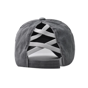 Close-up of washed cotton baseball cap with criss-cross elastic bands for ponytails