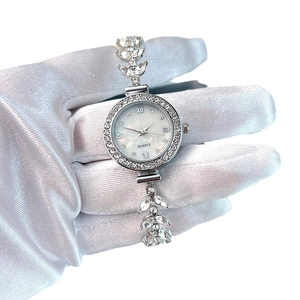 Luxurious silver mermaid watch with rhinestone leaf bracelet and mother-of-pearl dial