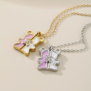 Elegant bear pendant necklaces in gold and silver finish with crystal enamel inlay
