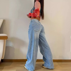 Women's vintage light blue high-waisted wide-leg denim jeans with a loose straight-leg fit