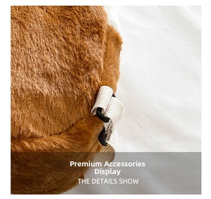 Detail view of brown plush kids backpack showing soft fabric texture and strap buckle