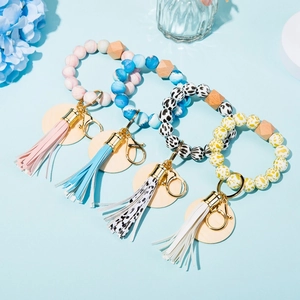 Silicone bead keychain bracelets with PU tassels and marble patterns in various colors