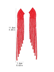 Macro shot of red rhinestone fringe earrings measuring 11.8cm in length and 1.6cm in width