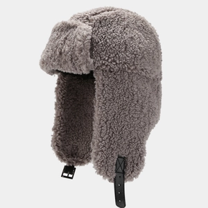 Detail of gray winter trapper hat with thick faux shearling lining and adjustable chin strap
