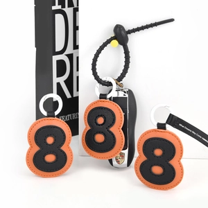 Classic PU leather number 8 keychain with orange and black contrast stitching for bags