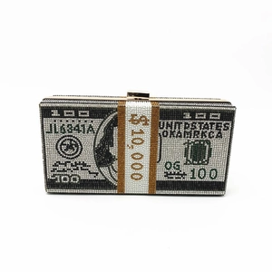 Detail of the sparkling rhinestone dollar bill clutch with metallic closure mechanism