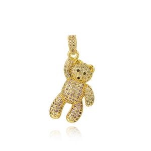 Detailed macro of golden panda teddy bear pendant with colorful sparkling rhinestones