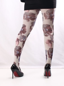 Detail of white printed tights with vibrant magenta flower pattern on model legs