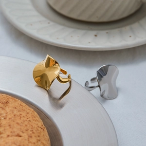 Minimalist irregular wave 18k gold and silver stainless steel rings with an open design