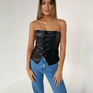 Front view of a black slim-fit PU leather tube top with buttons on a female model