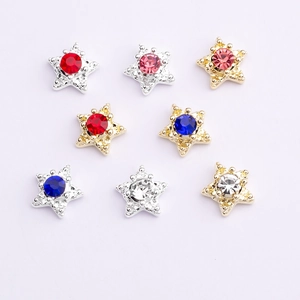 Star-shaped nail charms with colorful rhinestones in gold and silver alloy base