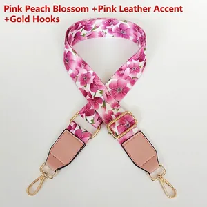 Pink floral fabric bag strap with premium leather ends and gold rotating metal hooks
