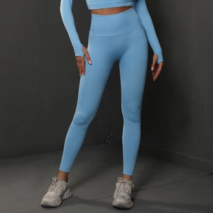 Seamless light blue two-piece yoga set with high-waist leggings and thumbhole crop top