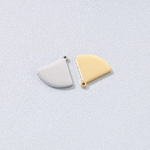 Polished titanium steel fan-shaped pendants in gold and silver finishes