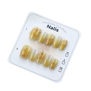 Golden cat eye press-on nails with yellow fireworks pattern in short square shape