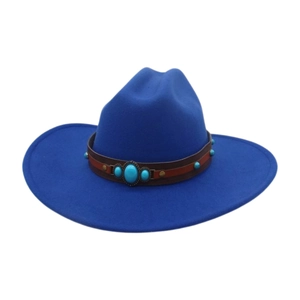Detail of dark blue fedora with brown leather band featuring turquoise and metal studs