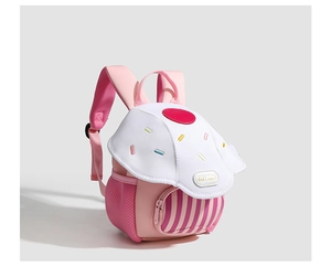 Detailed close-up of pink cupcake-shaped kids backpack with colorful sprinkles