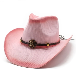 Pink gradient straw cowboy hat with bohemian woven band and metallic floral accent