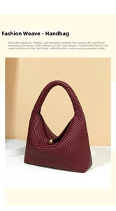 Detail showing deep red woven leather texture and gold sphere clasp on the hobo bag
