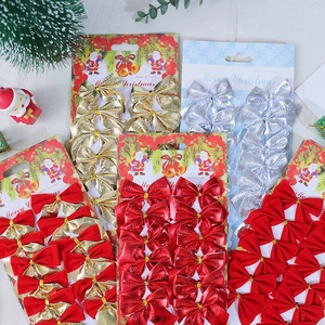 Close-up of 12pcs mini Christmas bows in red gold and silver for tree decoration