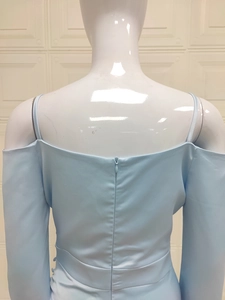 Back view of light blue off-shoulder dress with invisible zipper on white mannequin