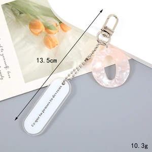 Pink marble acrylic keychain with silver hardware measuring 13.5cm and weighing 10.3g