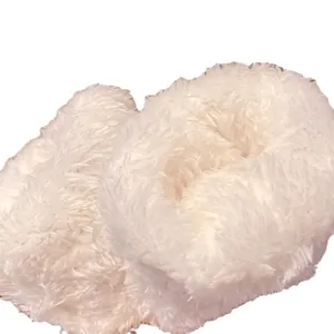 Pair of fluffy white faux fur scrunchies with thick elastic bands for women