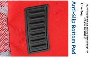 Detailed macro view of the non-slip bottom pad on a red fabric pet carrier backpack