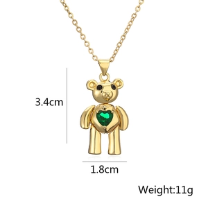 Golden teddy bear pendant necklace with green heart zircon and 3.4cm by 1.8cm dimensions