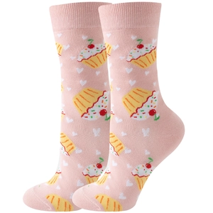 Pink crew socks featuring cupcake and heart patterns displayed on a white background